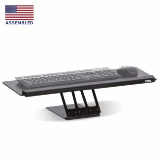 Isometric view of Repose countertop keyboard tray in high position with ghosted keyboard and mouse.