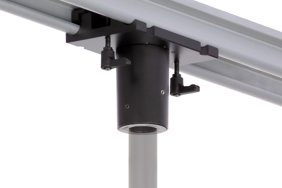 MKIT-W ceiling positioner mount closeup with brake knobs shown in RT rail with pole attached from an isometric view below